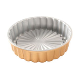 Nordic Ware Charlotte Cake Pan for creating elegant layered desserts with a durable design and 6-cup capacity.