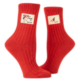 Blue Q Tag Socks in Small/Medium featuring witty tags, made from organic cotton with spandex for comfort and stretch.