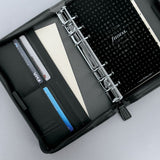 Filofax Metropol Zip Personal Organizer in Black, featuring a sleek design for ultimate organization and efficiency.