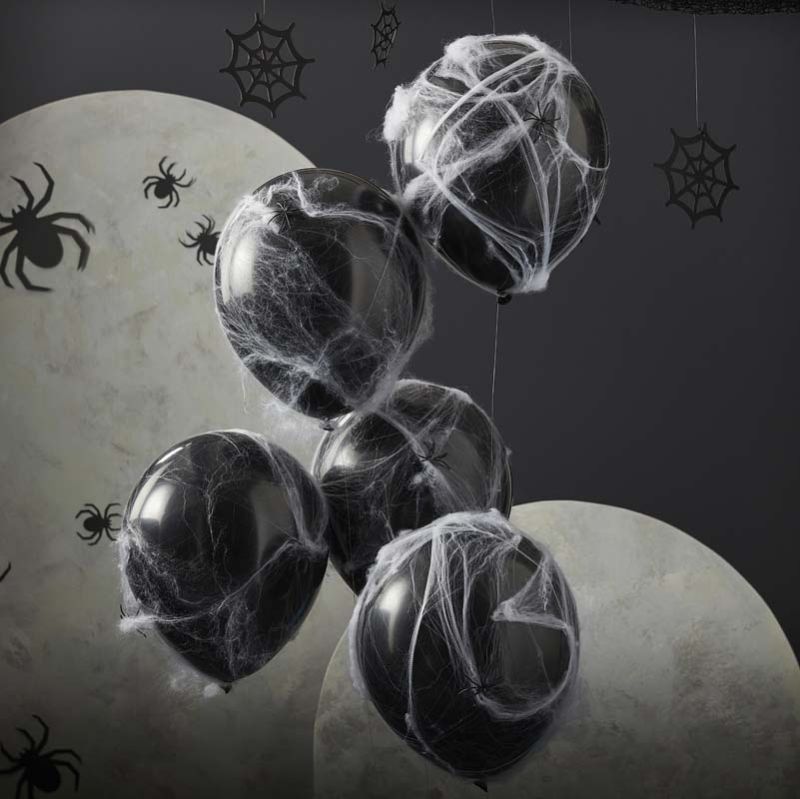 Black Halloween balloons with spiders and cobwebs for spooky celebrations, perfect for parties and trick-or-treat events.