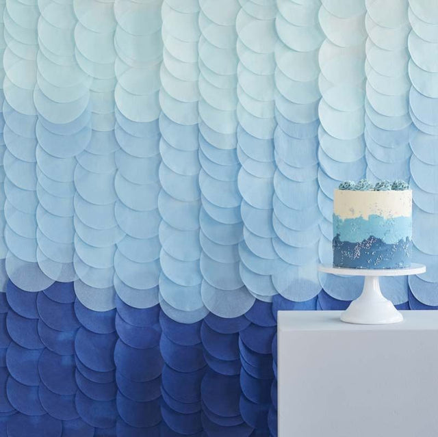 Blue ombre tissue paper disc backdrop, perfect for parties, photo booths, and eco-friendly celebrations, 200cm x 200cm.