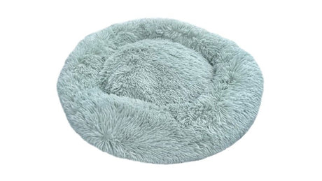 Seafoam small calming pet bed with removable cover, non-slip base, and supportive doughnut shape for anxiety relief.