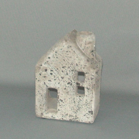 Elegant 15cm Tealite House, a durable centerpiece enhancing home decor with charm and versatility for any room.