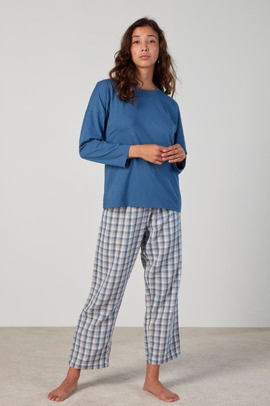 Casual plaid PJ set featuring a long sleeve bamboo top and cotton pants with an elastic waistband and drawstring.