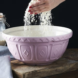 Mason Cash Colours Pink 26cm Mixing Bowl in powder pink, durable earthenware with patterned grip for easy mixing and pouring.