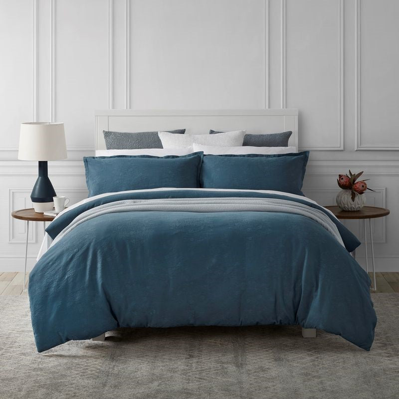 Stonewashed jacquard BALSAM duvet cover set in mid blue, includes two matching Oxford pillowcases, made from 100% certified cotton.