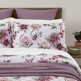 Duvet Cover Set featuring a protea print on lilacberry, made from 100% cotton sateen, designed by BAKSANA in NZ.