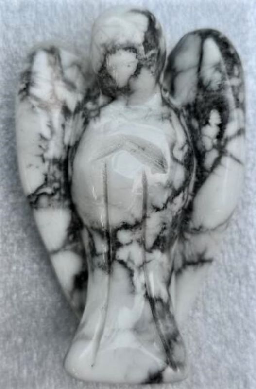 2-inch white howlite angel figurine, symbolizing purity and tranquility, ideal for home decor and meditation spaces.