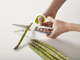 Joseph Joseph PowerGrip kitchen scissors with thumb grip, serrated edge, and herb stripper for versatile kitchen tasks.