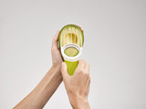 Ergonomic avocado tool with folding blade, stainless-steel pitter, and scoop for easy slicing and preparation.