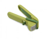 Ergonomic Joseph Joseph Cleanforce Garlic Press with easy-squeeze mechanism and built-in wiper for effortless garlic crushing.