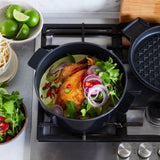 Mid blue 28cm cast iron French oven with dual-purpose grill lid, durable enamel, and magnetic trivets for easy serving.