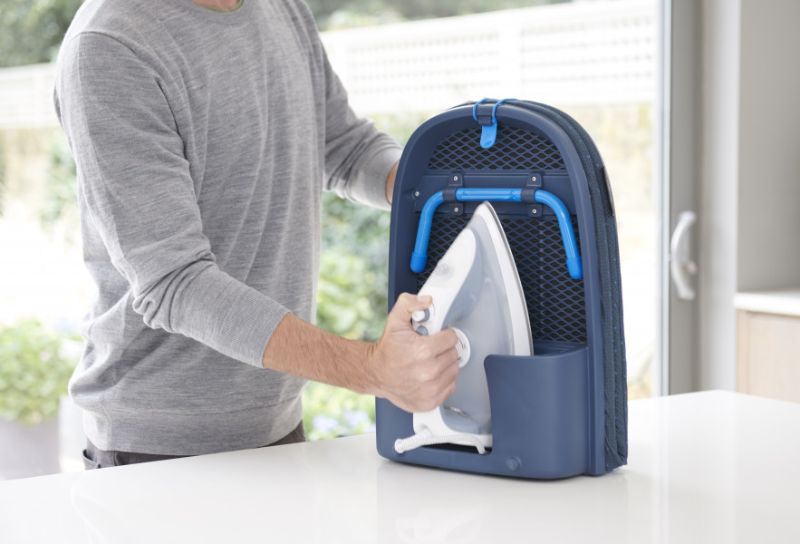 Compact Joseph Joseph Pocket Plus ironing board with integrated iron storage, folds for easy storage, and features DripLock™ technology.