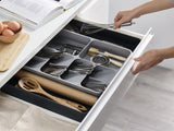 Joseph Joseph DrawerStore organizer with expanding sides, five cutlery compartments, and deep sections for utensils and gadgets.