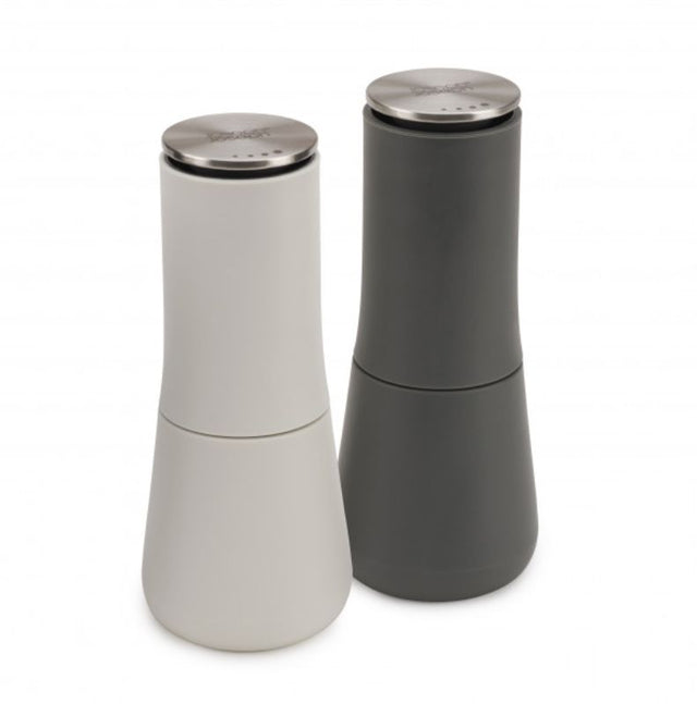 Joseph Joseph Milltop Salt and Pepper Set with inverted design and ceramic grinder for mess-free seasoning.