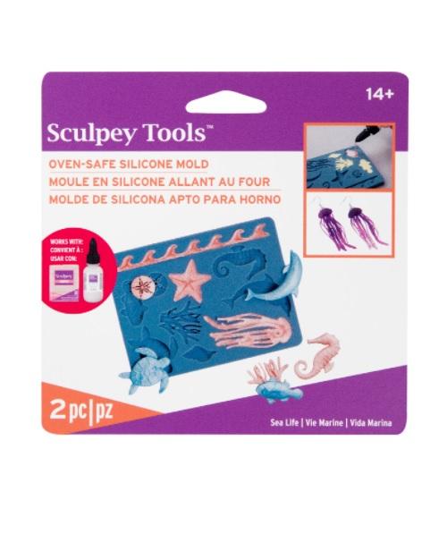 Silicone bakeable mold featuring detailed sea life designs for crafting with oven-bake and Liquid Sculpey clay.