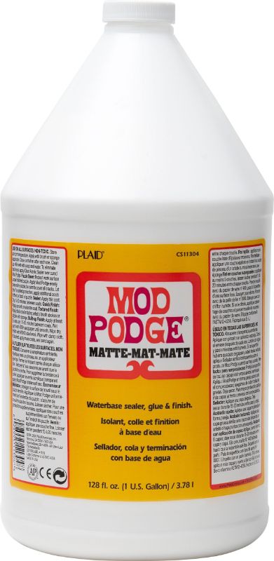 Mod Podge Matte 64oz decoupage glue with quick-drying, non-toxic formula for versatile crafting and a durable matte finish.