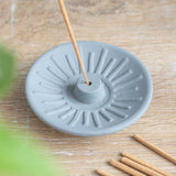 Grey Energy Terracotta Incense Plate, 2 cm high and 9 cm wide, ideal for creating a serene atmosphere during meditation.