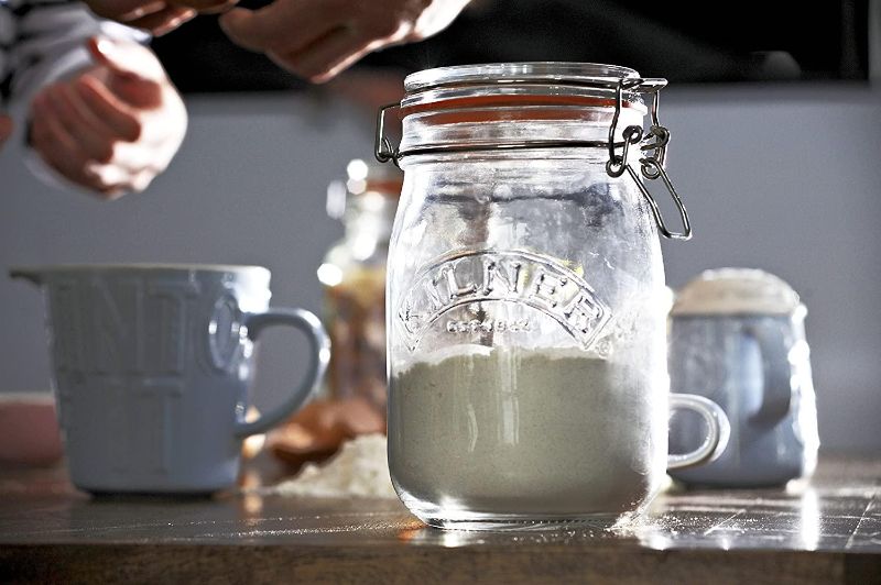 Kilner Round Clip Top Jar Glass, 1L, with embossed design and airtight seal for versatile, stylish food storage.