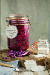 Kilner Round Clip Top Jar Glass: vintage 1L glass jar with airtight seal for storing dry and wet foods, featuring embossed design.