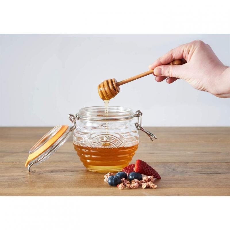 Kilner Honey Pot with beehive design, airtight lid, and beechwood dipper for stylish honey storage and serving.