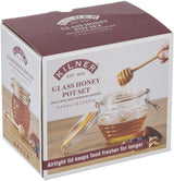 Kilner Honey Pot with embossed beehive design, airtight seal, and wooden dipper for serving and storing honey elegantly.