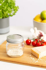 Kilner Fine Grater Storage Jar (250ml) with stainless steel micro-blade grater for effortless grating and zesting.