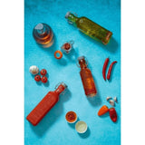 Kilner 1 Litre Clip Top Bottle in clear glass, perfect for preserving sauces, oils, and vinegars with a stylish design.