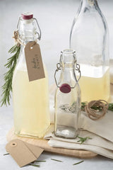 Kilner Square Clip Top Bottle in glass, featuring airtight seal and clip-top lid, perfect for preserving oils and homemade beverages.