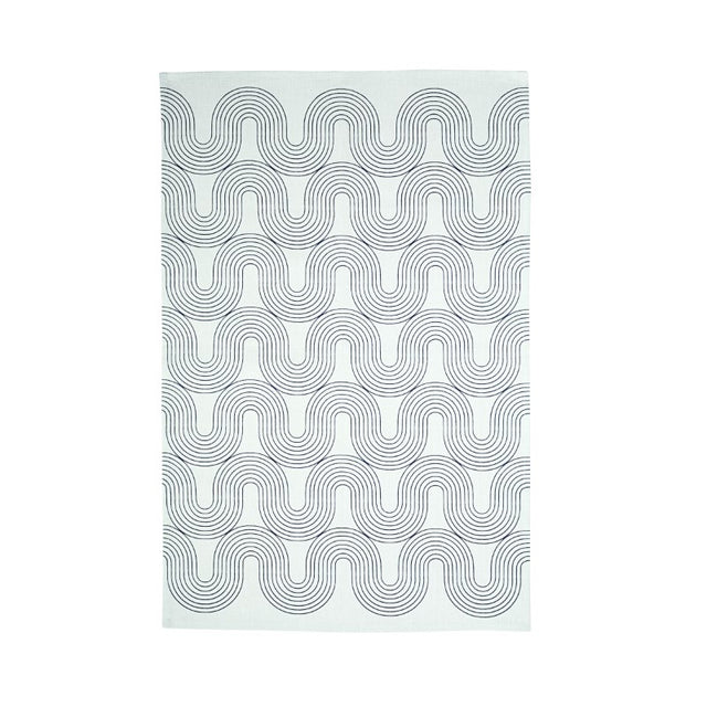 Cotton tea towel featuring geometric designs inspired by Northern Ireland's Giant's Causeway, crafted from recycled materials.