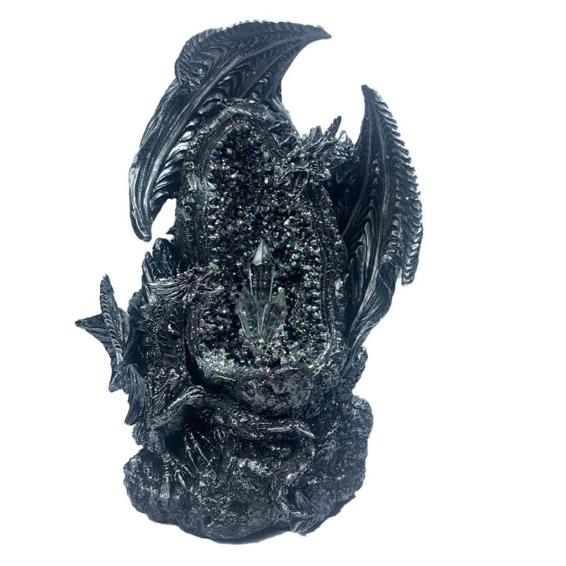 Intricate black dragon cradles baby in LED-lit crystal cave, casting colorful ambient light for fantasy decor.