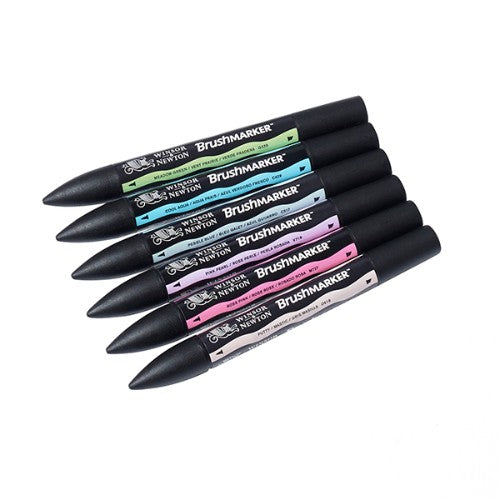 Winsor & Newton BrushMarkers Set in Pastel Tones featuring wide brush and broad nibs for smooth blending and detailed artwork.