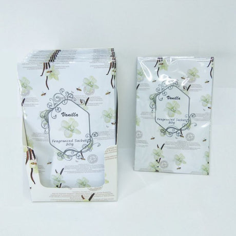 Vanilla-scented sachets in a 12-piece display, perfect for freshening spaces with warmth and elegance.