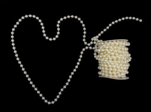 Elegant 10M faux pearl chain garland, perfect for wedding and holiday decor, enhancing any event with a sophisticated touch.