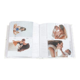 Stylish linen photo album with gold foil accents, holds 200 4x6 photos, features memo space for memories, and protective box.