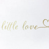 Elegant photo album in natural linen, holding 200 photos with gold foil embossing and memo space for cherished memories.