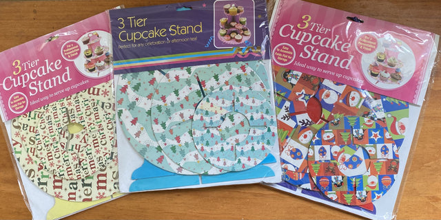 Three-tier Christmas cupcake stand set featuring assorted elegant designs, perfect for festive dessert displays.