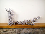Cone garland with faux snow, 1.8m long, perfect for festive decor on mantels, doorways, or Christmas trees.
