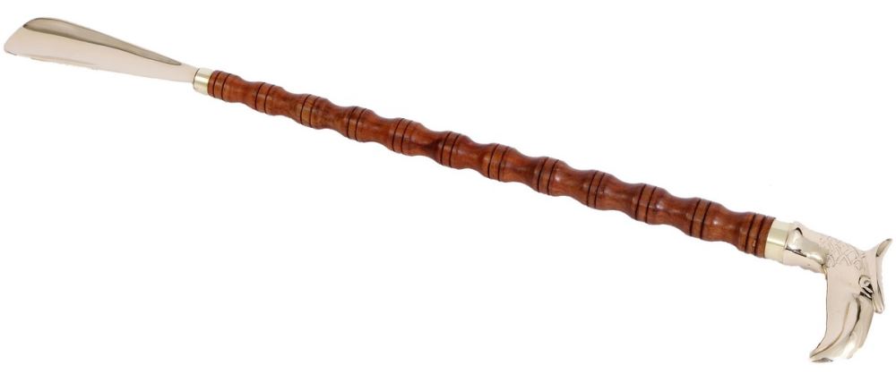 Elegant shoe horn with walnut finish and brass accents, featuring a unique bird head design, perfect for style and functionality.