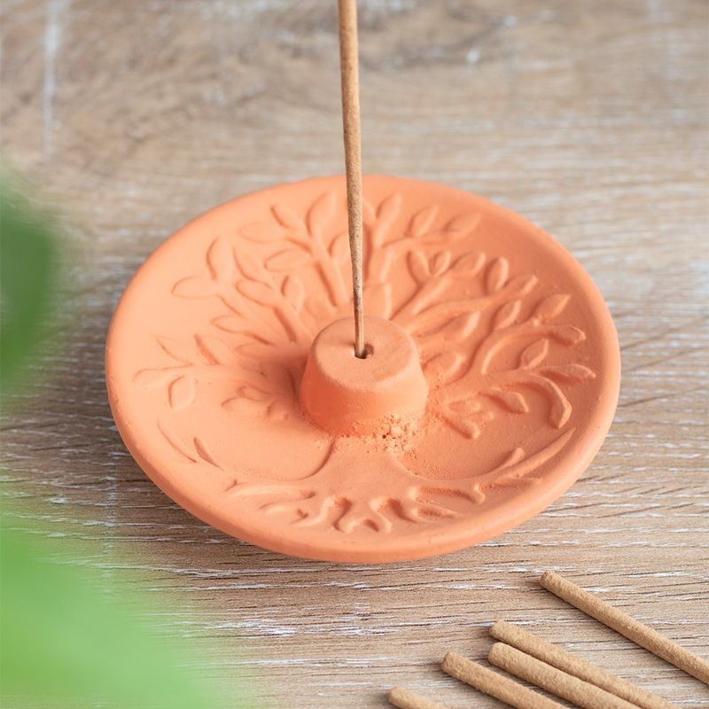 Terracotta incense plate featuring an intricate Tree of Life design, perfect for meditation and enhancing home decor.