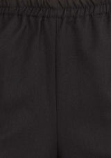 Ladies Easy Fit Pant in black, featuring tapered legs, deep pockets, and a soft polyester-bamboo blend for all-day comfort.
