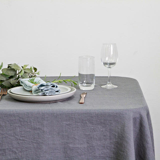 Elegant grey 100% linen table cloth, measuring 150 x 260cm, perfect for stylish dining and versatile decor.