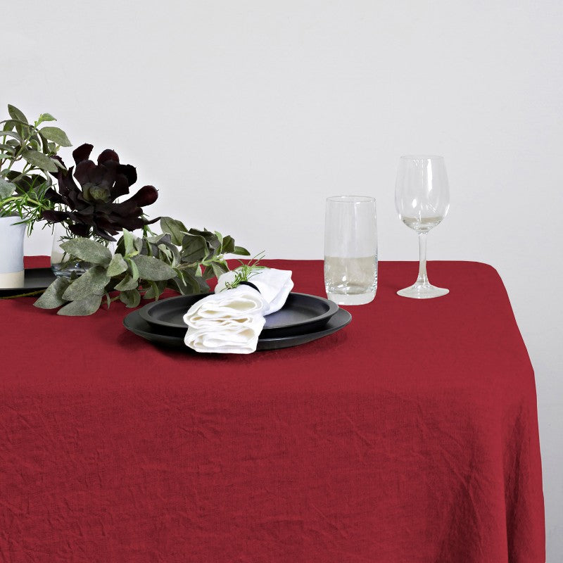 Vibrant red 100% linen tablecloth, 150 x 260cm, ideal for elegant dining and special occasions, crafted in India.