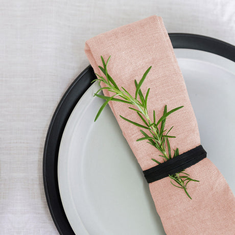 Set of 4 premium 100% linen napkins in natural texture, perfect for elegant dining occasions, measuring 50 x 50 cm.