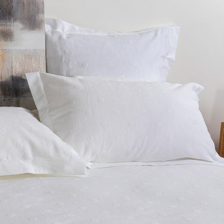 Elegant white Matelasse Elise pillow sham (75cm) with textured design, made from 100% cotton for comfort and style.