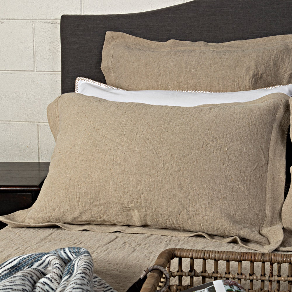 Natural stone-washed linen euro pillow cover, 65x65 cm, adding casual elegance and comfort to bedroom decor.