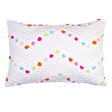 Hand-quilted Madelyn Standard Pillowcase with vibrant colors, pom poms, and soft 100% cotton for a cozy sleep.