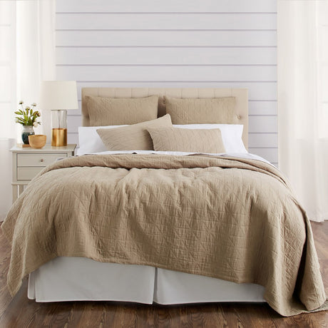 Elegant taupe queen quilt (240cm) featuring diamond-patterned stitching, crafted from 100% cotton for comfort and durability.