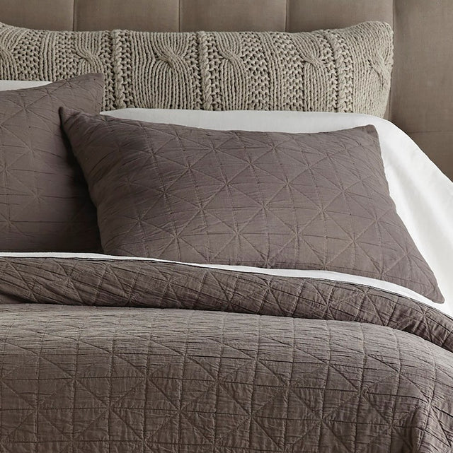 Luxurious charcoal pillow sham in diamond grid pattern, made from 100% cotton, perfect for enhancing bedroom decor.