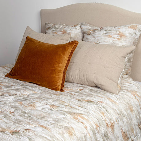 Murdock Queen Quilt featuring an abstract watercolor design, 400 thread count cotton, and linen backing for stylish comfort.